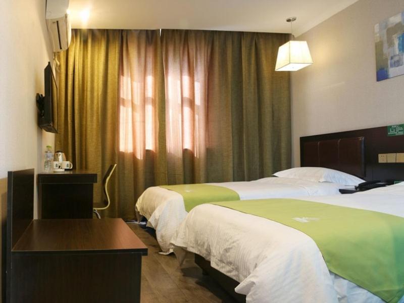 Greentree Wulumuqi Airport Hotel Urumqi Esterno foto