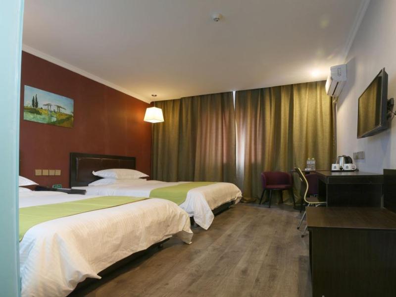 Greentree Wulumuqi Airport Hotel Urumqi Esterno foto