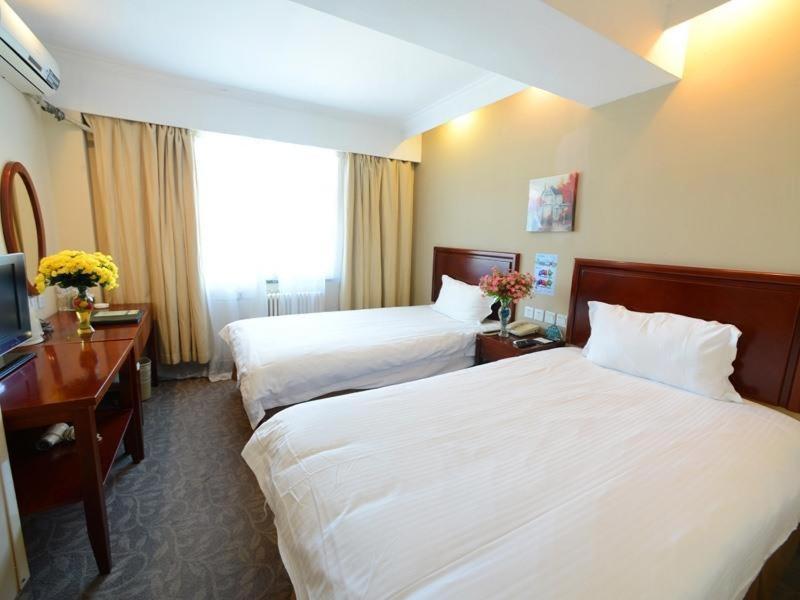 Greentree Wulumuqi Airport Hotel Urumqi Esterno foto